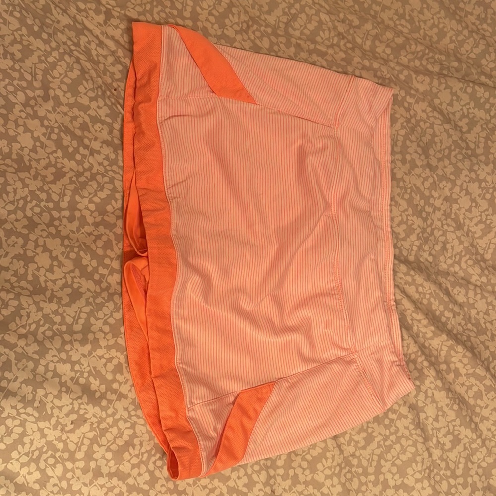 White champion skirt with coral lines